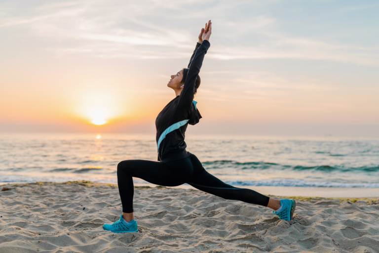 young woman doing yoga agadir beach